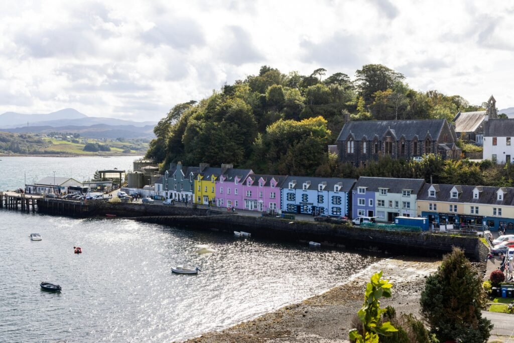Charming view of Portree's colorful waterfront houses on the Isle of Skye.